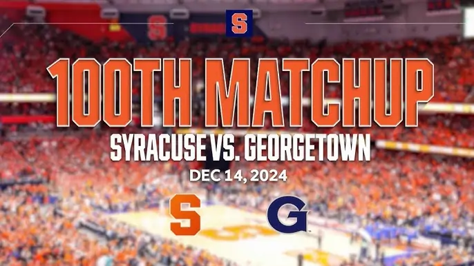 100th Matchup Syracuse-Georgetown, Dec 14, 2024, with Syracuse Orange crowd in the background at the JMA Wireless Dome.