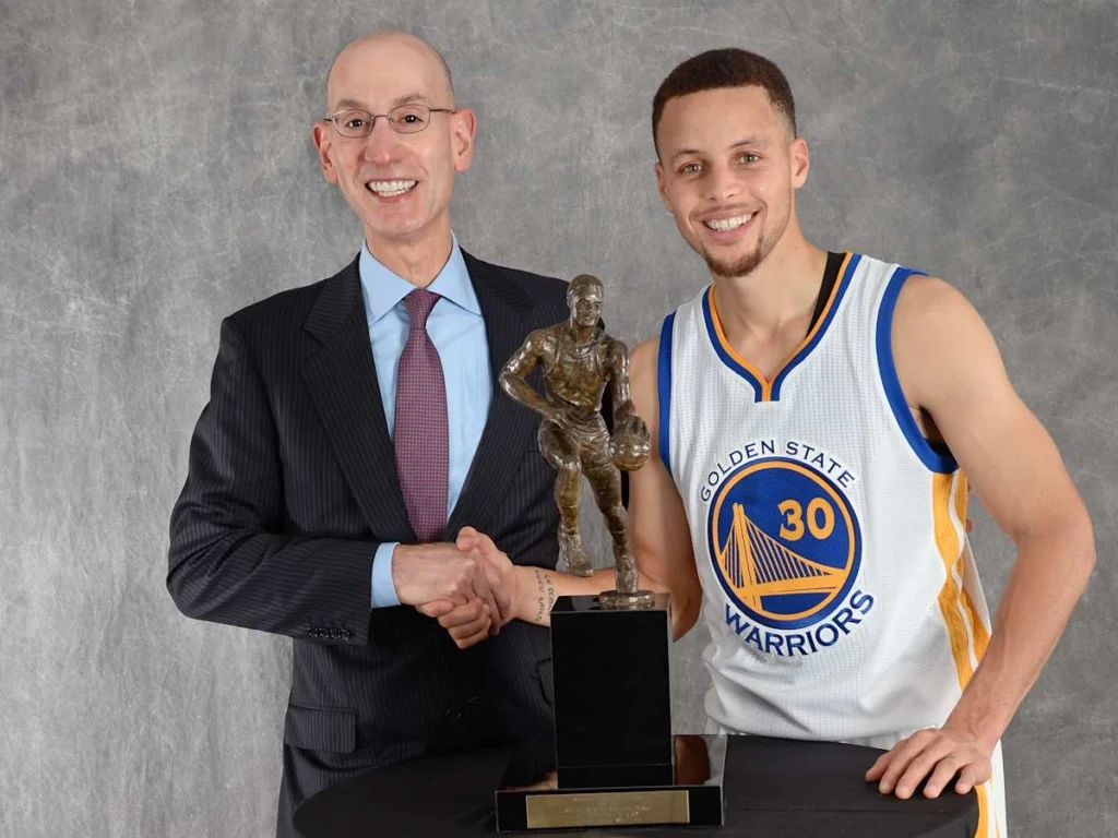 adam-silver-stephen-curry-mvp-handshakejpg-ezgif.com-jpg-to-webp-converter